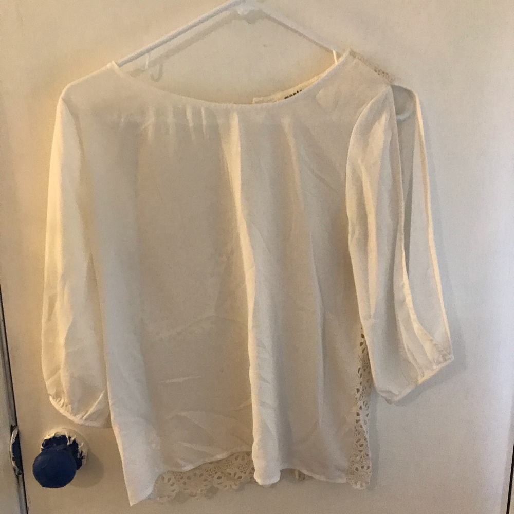 Fancy white colored shirt with fun design on back